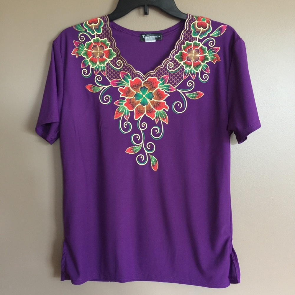 TC Fashion purple blouse w/flowers along neckline